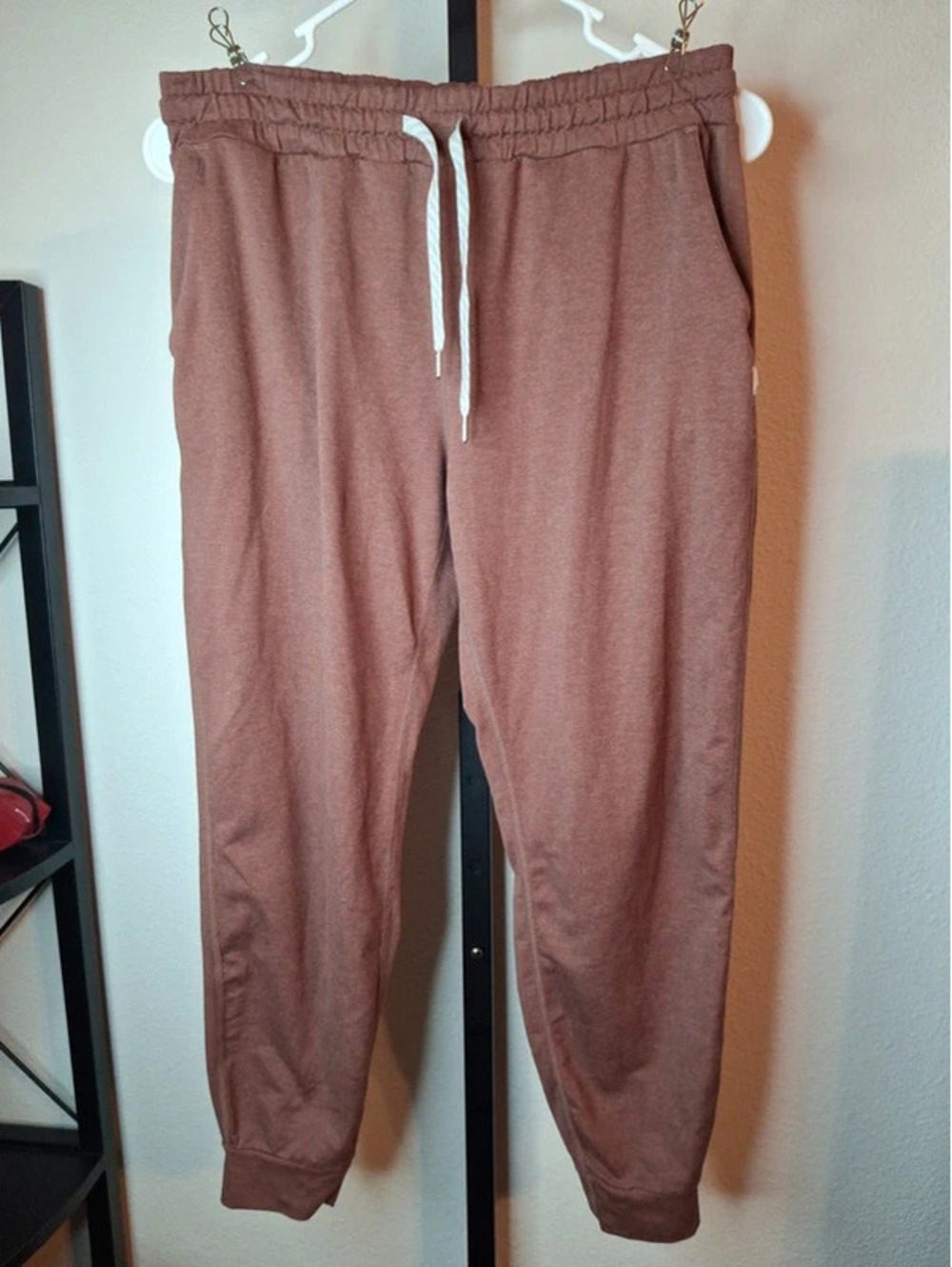 Vuori Performance Joggers in a Heathered Rust-brown Shade